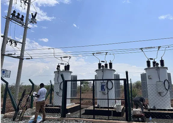 Rockwill three-phase MV line voltage regulators installed at a distribution network site.